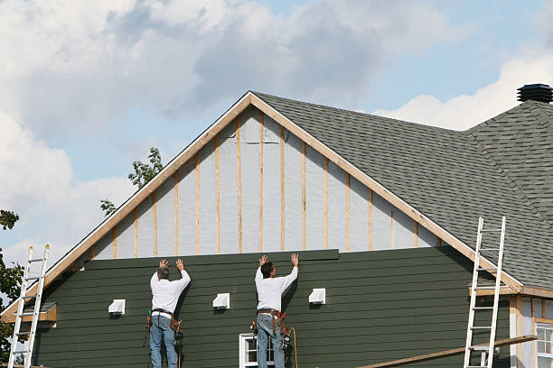 Professional Siding technician working in Olin, NC